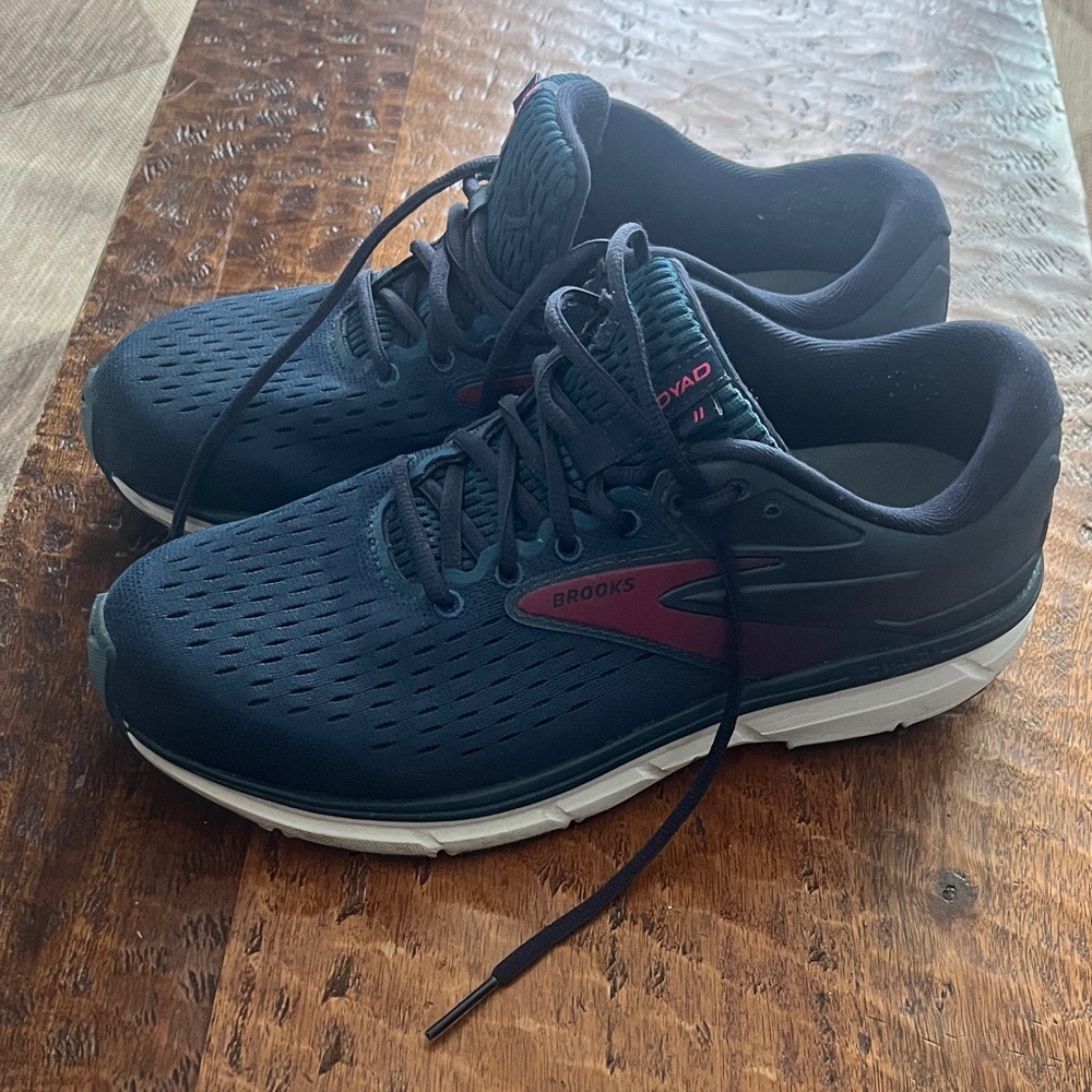 Brooks Dark Blue Athletic Shoes with Red Highlights
